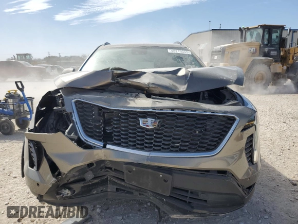 2020 Cadillac XT4 FWD Sport z VIN 1GYFZER40LF134537, wystawiony jako Copart lot #48219045 z przebiegiem 77 307 mil mil oraz Szkoda całkowita • Salvage title. Historia ofert i sprzedaży dostępna na DreamBid. Obrazek 5.
