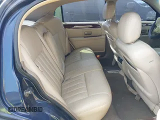 2003 Lincoln Town Car Executive z VIN 1LNHM81W43Y632820, wystawiony jako IAAI lot #42048881 z przebiegiem 137 738 mil mil oraz . Historia ofert i sprzedaży dostępna na DreamBid. Obrazek 8.