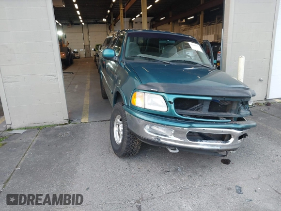 1997 Ford F-150 XL with VIN 1FTEX18L1VKB44867, listed as a IAAI auction lot 41266572 with 105,061 mi miles. Bid and sale history available at carsss.com. Image 1.