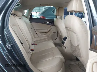 2014 Audi A6 Premium Plus z VIN WAUGFAFC7EN025053, wystawiony jako IAAI lot #42131033 z przebiegiem 154 552 mil mil oraz . Historia ofert i sprzedaży dostępna na DreamBid. Obrazek 8.