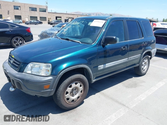 1998 Honda CR-V LX z VIN JHLRD1843WC083751, wystawiony jako IAAI lot #42356438 z przebiegiem 167 342 mil mil oraz . Historia ofert i sprzedaży dostępna na DreamBid. Obrazek 17.