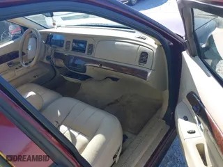 2006 Mercury Grand Marquis LS Premium with VIN 2MEFM75V06X622375, listed as a IAAI auction lot 41686035 with 165,495 mi miles. Bid and sale history available at carsss.com. Image 5.