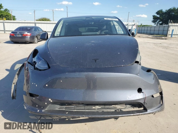 2022 Tesla Model Y Performance with VIN 7SAYGDEF8NF384270, listed as a Copart auction lot 56718215 with Not provided miles and Salvage title. Bid and sale history available at DreamBid. Image 5.