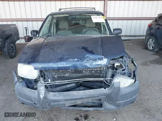 2004 Ford Escape XLT with VIN 1FMYU93194KA77634, listed as a IAAI auction lot 41663464 with 149,600 mi miles. Bid and sale history available at carsss.com. Image 12.