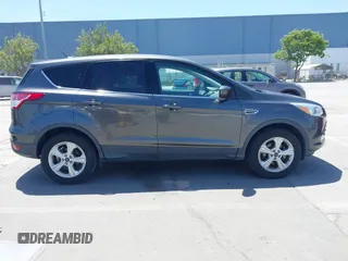 2015 Ford Escape SE with VIN 1FMCU0G78FUC43685, listed as a IAAI auction lot 42189242 with 81,437 mi miles. Bid and sale history available at carsss.com. Image 14.