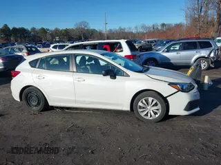 2020 Subaru Impreza with VIN 4S3GTAB62L3708475, listed as a IAAI auction lot 41211458 with 32,510 mi miles and . Bid and sale history available at DreamBid. Image 13.