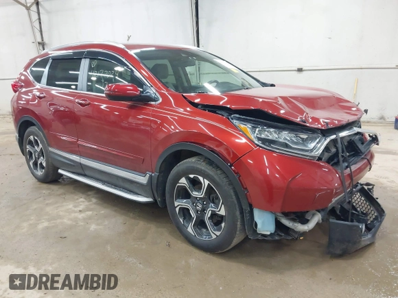 2017 Honda CR-V Touring with VIN 2HKRW2H95HH610401, listed as a IAAI auction lot 42177024 with 42,494 mi miles and . Bid and sale history available at carsss.com. Image 1.