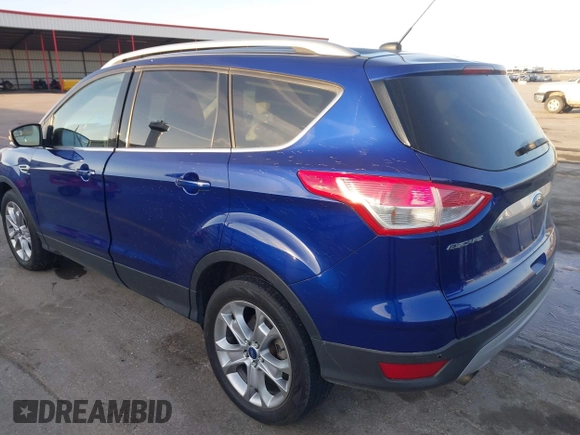 2014 Ford Escape Titanium with VIN 1FMCU9JX4EUD30964, listed as a IAAI auction lot 41772153 with 179,481 mi miles and . Bid and sale history available at DreamBid. Image 3.