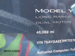 2023 Tesla Model Y Long Range with VIN 7SAYGAEE7PF713761, listed as a IAAI auction lot 41638067 with 46,089 mi miles and . Bid and sale history available at DreamBid. Image 15.