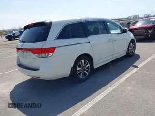 2016 Honda Odyssey Touring Elite with VIN 5FNRL5H97GB044278, listed as a IAAI auction lot 42056101 with 182,396 mi miles and . Bid and sale history available at DreamBid. Image 4.