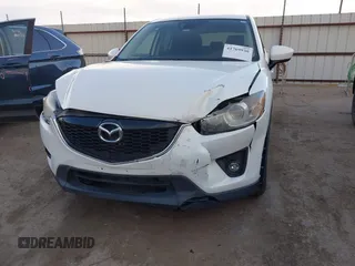 2014 Mazda CX-5 Touring with VIN JM3KE2CY8E0321578, listed as a IAAI auction lot 41769930 with 101,724 mi miles. Bid and sale history available at carsss.com. Image 6.