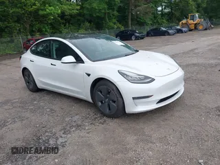2021 Tesla Model 3 Standard Range Plus z VIN 5YJ3E1EA6MF854245, wystawiony jako IAAI lot #42227585 z przebiegiem 51 206 mil mil oraz . Historia ofert i sprzedaży dostępna na DreamBid. Obrazek 1.