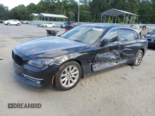 2015 BMW 7 Series 740Li with VIN WBAYE4C58FD138919, listed as a Copart auction lot 69409074 with 145,549 mi miles and Salvage Title. Bid and sale history available at DreamBid. Image 1.