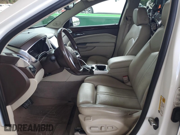 2014 Cadillac SRX Premium Collection with VIN 3GYFNDE32ES651159, listed as a Copart auction lot 61543815 with 177,289 mi miles and Salvage title. Bid and sale history available at DreamBid. Image 7.
