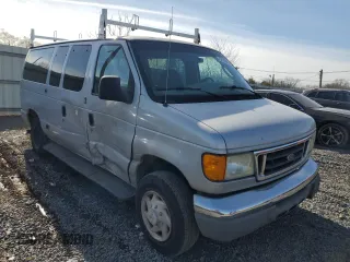 2005 Ford Econoline Passenger XL with VIN 1FBNE31LX5HA76002, listed as a Copart auction lot 43599865 with 198,749 mi miles and Salvage Title. Bid and sale history available at carsss.com. Image 4.