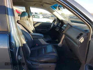 2007 Honda Pilot EX-L with VIN 2HKYF18697H540993, listed as a IAAI auction lot 41243560 with 320,290 mi miles and . Bid and sale history available at DreamBid. Image 5.