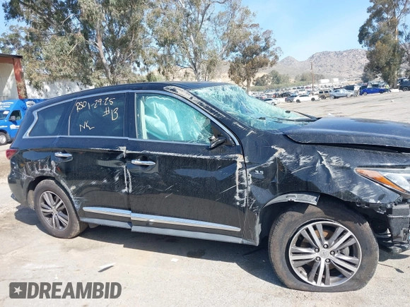 2020 Infiniti QX60 Luxe with VIN 5N1DL0MN2LC519810, listed as a IAAI auction lot 41593542 with Not provided miles and . Bid and sale history available at DreamBid. Image 12.