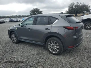 2020 Mazda CX-5 Grand Touring with VIN JM3KFADM6L0839527, listed as a Copart auction lot 46677475 with 50,305 mi miles and Salvage Title. Bid and sale history available at DreamBid. Image 2.
