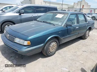1996 Oldsmobile Cutlass Ciera 1SA VX5 z VIN 1G3AJ55M5T6418193, wystawiony jako IAAI lot #42361441 z przebiegiem 193 675 mil mil oraz . Historia ofert i sprzedaży dostępna na DreamBid. Obrazek 2.