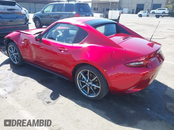 2018 Mazda MX-5 Miata Grand Touring with VIN JM1NDAM7XJ0204135, listed as a IAAI auction lot 42474750 with 16,852 mi miles and . Bid and sale history available at DreamBid. Image 3.