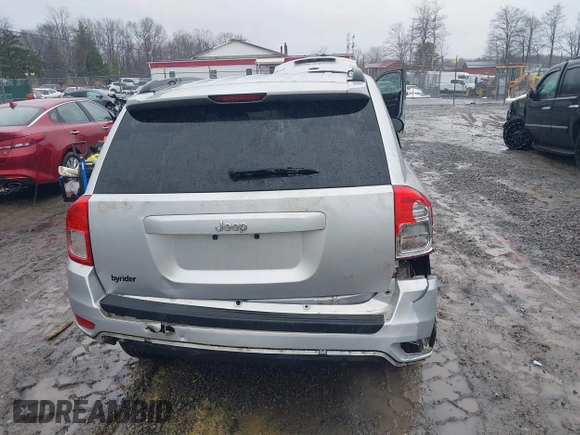 2013 Jeep Compass Sport with VIN 1C4NJCBA8DD264902, listed as a IAAI auction lot 41440255 with 144,877 mi miles. Bid and sale history available at carsss.com. Image 16.