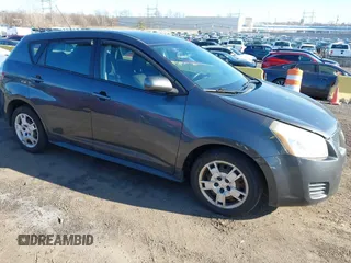 2009 Pontiac Vibe w/1SB with VIN 5Y2SP67099Z402069, listed as a IAAI auction lot 41868678 with 165,878 mi miles. Bid and sale history available at carsss.com. Image 1.
