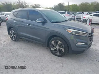 2016 Hyundai Tucson Limited with VIN KM8J33A27GU245096, listed as a IAAI auction lot 41961905 with 101,195 mi miles. Bid and sale history available at carsss.com. Image 1.