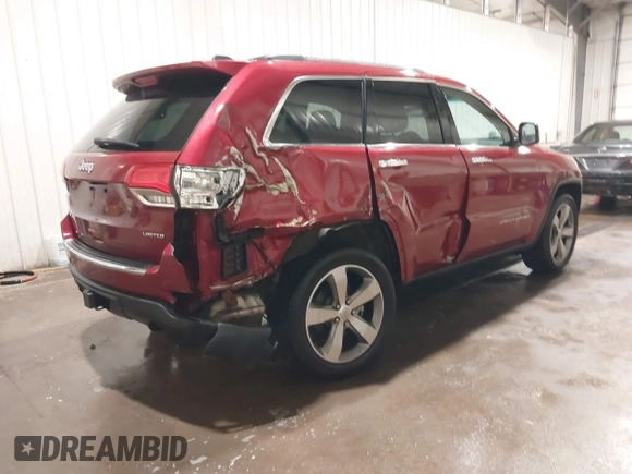 2014 Jeep Grand Cherokee Limited with VIN 1C4RJFBT1EC139798, listed as a IAAI auction lot 41772069 with 122,282 mi miles and . Bid and sale history available at DreamBid. Image 4.