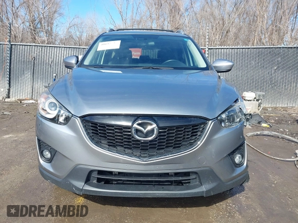 2014 Mazda CX-5 Grand Touring with VIN JM3KE2DY8E0375025, listed as a IAAI auction lot 41657755 with 103,601 mi miles. Bid and sale history available at carsss.com. Image 12.