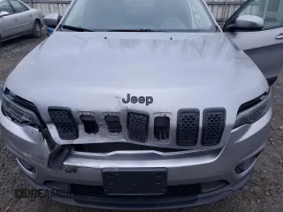 2021 Jeep Cherokee Latitude Plus z VIN 1C4PJLLBXMD143997, wystawiony jako Copart lot #87973025 z przebiegiem 64 267 mil mil oraz Szkoda całkowita • Salvage title. Historia ofert i sprzedaży dostępna na DreamBid. Obrazek 11.