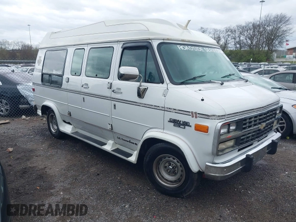 1994 Chevrolet Chevy Van z VIN 1GBEG25K7RF187968, wystawiony jako IAAI lot #41805666 z przebiegiem 224 279 mil mil oraz . Historia ofert i sprzedaży dostępna na DreamBid. Obrazek 1.