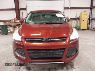 2016 Ford Escape SE z VIN 1FMCU9GX6GUC08682, wystawiony jako IAAI lot #42109775 z przebiegiem 190 071 mil mil oraz . Historia ofert i sprzedaży dostępna na DreamBid. Obrazek 6.