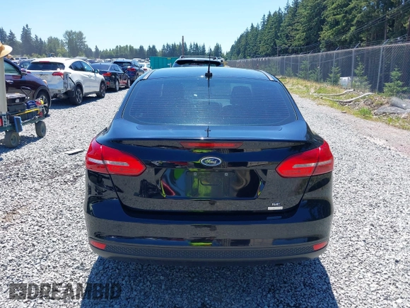 2018 Ford Focus SE z VIN 1FADP3FE5JL279274, wystawiony jako IAAI lot #42626587 z przebiegiem 92 110 mil mil oraz . Historia ofert i sprzedaży dostępna na DreamBid. Obrazek 17.