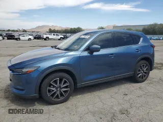 2018 Mazda CX-5 Grand Touring with VIN JM3KFBDM3J0323211, listed as a Copart auction lot 61166735 with Not provided miles and Salvage title. Bid and sale history available at DreamBid. Image 1.