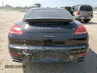 2016 Porsche Panamera 4 z VIN WP0AA2A74GL005381, wystawiony jako Copart lot #58396365 z przebiegiem 161 230 mil mil oraz Czysty tytuł • Clean title. Historia ofert i sprzedaży dostępna na DreamBid. Obrazek 6.