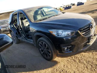 2016 Mazda CX-5 Grand Touring with VIN JM3KE4DY0G0731384, listed as a Copart auction lot 44741695 with 58,727 mi miles and Salvage Title. Bid and sale history available at carsss.com. Image 4.