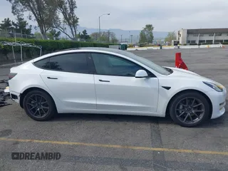 2021 Tesla Model 3 Long Range with VIN 5YJ3E1EB7MF089524, listed as a IAAI auction lot 42023474 with 19,757 mi miles and . Bid and sale history available at carsss.com. Image 14.