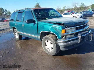 1996 Chevrolet Tahoe with VIN 1GNEK13R9TJ392739, listed as a IAAI auction lot 41559513 with 257,457 mi miles. Bid and sale history available at carsss.com. Image 1.