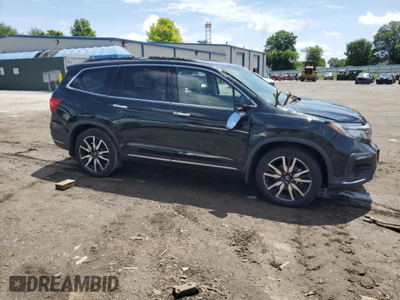 2020 Honda Pilot Touring 8-Passenger with VIN 5FNYF6H99LB053227, listed as a Copart auction lot 61302225 with 118,156 mi miles and Salvage title. Bid and sale history available at DreamBid. Image 4.