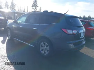 2013 Chevrolet Traverse LT with VIN 1GNKVGKD4DJ210384, listed as a IAAI auction lot 41881058 with 205,045 mi miles and . Bid and sale history available at DreamBid. Image 3.