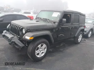 2022 Jeep Wrangler Unlimited Sport with VIN 1C4HJXDG1NW251565, listed as a IAAI auction lot 41163076 with 24,877 mi miles and . Bid and sale history available at DreamBid. Image 17.