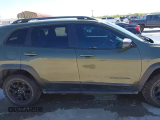 2019 Jeep Cherokee Trailhawk Elite with VIN 1C4PJMBN7KD287506, listed as a IAAI auction lot 42072589 with 108,034 mi miles and . Bid and sale history available at DreamBid. Image 13.