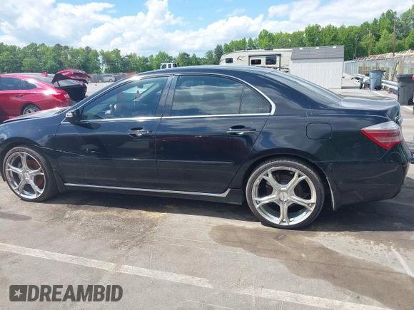 2011 Acura RL Technology z VIN JH4KB2F61BC000373, wystawiony jako IAAI lot #42198721 z przebiegiem 132 384 mil mil oraz . Historia ofert i sprzedaży dostępna na DreamBid. Obrazek 14.