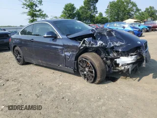 2015 BMW 4 Series 435i xDrive with VIN WBA3R5C54FK371700, listed as a Copart auction lot 60318895 with 99,388 mi miles and Clean title. Bid and sale history available at DreamBid. Image 4.
