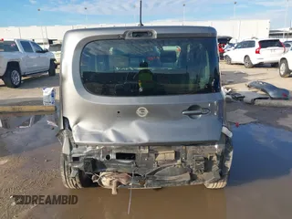 2013 Nissan Cube SL z VIN JN8AZ2KR8DT301092, wystawiony jako IAAI lot #41328574 z przebiegiem Nie podano mil oraz . Historia ofert i sprzedaży dostępna na DreamBid. Obrazek 17.