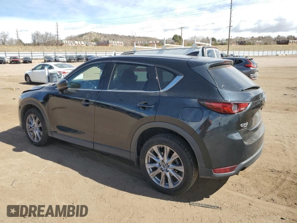2020 Mazda CX-5 Grand Touring with VIN JM3KFBDMXL1735154, listed as a Copart auction lot 49313585 with 82,750 mi miles and Salvage Title. Bid and sale history available at DreamBid. Image 2.