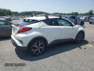 2018 Toyota C-HR XLE with VIN NMTKHMBX6JR027395, listed as a Copart auction lot 63071605 with 124,293 mi miles and Clean title. Bid and sale history available at DreamBid. Image 3.