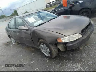 2000 Nissan Altima XE with VIN 1N4DL01D9YC200403, listed as a IAAI auction lot 36477575 with 182,499 mi miles and . Bid and sale history available at DreamBid. Image 1.