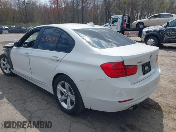 2015 BMW 3 Series 328i xDrive with VIN WBA3B5C51FF960765, listed as a IAAI auction lot 42074658 with 106,598 mi miles and . Bid and sale history available at DreamBid. Image 3.