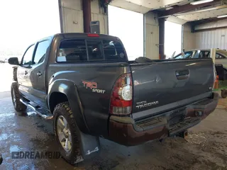 2013 Toyota Tacoma with VIN 3TMLU4EN7DM121253, listed as a IAAI auction lot 42498187 with 145,604 mi miles and . Bid and sale history available at DreamBid. Image 3.